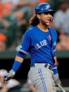 Toronto Blue Jays' Bo Bichette reacts after fouling off a pitch from Baltimore Orioles starter Asher Wojciechowski during the third inning of a baseball game Thursday, Aug. 1, 2019, in Baltimore. (AP Photo/Julio Cortez)
