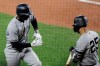 New York Yankees' Didi Gregorius, left, celebrates his solo home run off Baltimore Orioles starting pitcher Asher Wojciechowski with Gleyber Torres during the third inning of a baseball game Tuesday, Aug. 6, 2019, in Baltimore. (AP Photo/Julio Cortez)