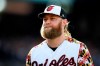Baltimore Orioles starter Andrew Cashner walks back to the dugout after he pitched the top of the fourth inning of a baseball game against the Cleveland Indians, Saturday, June 29, 2019, in Baltimore. (AP Photo/Nick Wass)