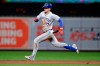 Toronto Blue Jays' Cavan Biggio heads to second with ad double off Baltimore Orioles pitcher Shawn Armstrong during the eighth inning of a baseball game Tuesday, Sept. 17, 2019, in Baltimore. The Blue Jays won 8-5. (AP Photo/Julio Cortez)