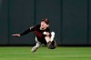 Baltimore Orioles center fielder Austin Hays makes a diving catch on a ball hit by Seattle Mariners' Omar Narvaez during the ninth inning of a baseball game Friday, Sept. 20, 2019, in Baltimore. (AP Photo/Julio Cortez)