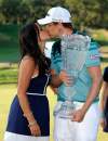 Kathy Kmonicek / the associated press
Nick Watney kisses his wife Amber after winning The Barclays golf tournament at Bethpage State Park in Farmingdale, N.Y. Sunday.