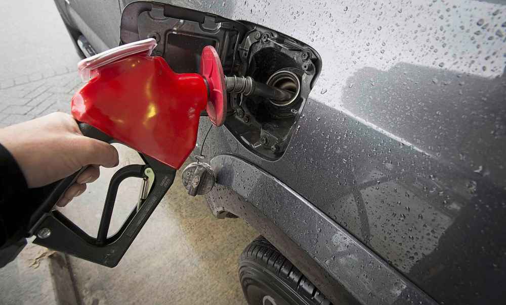 As long gas is relatively inexpensive and registration fees are relatively low, Canadians will continue to buy big vehicles that burn an unconscionable amount of fossil fuel. (Jonathan Hayward / The Canadian Press files)