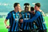 Atalanta's Duvan Zapata, center, celebrates with teammates after scoring his team's opening goal during the Italian Serie A soccer match between Atalanta and Lazio at the Atleti Azzurri d'Italia stadium in Bergamo, Italy, Monday, Dec. 17 2018. (Paolo Magni/ANSA via AP)