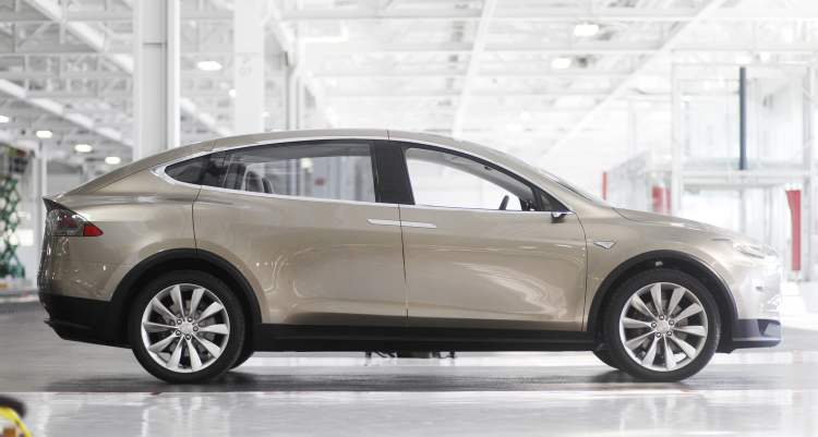 MCT
Tesla is marketing the Model X to women as a family SUV after extensive research -- its 'Falcon wing' passenger doors, large rear trunk and 'frunk', or front trunk, were among the results.