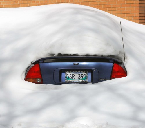 Extreme? Perhaps, but it's not uncommon to see cars on the road still covered in snow.