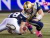 Nathan Denette / The Canadian Press
Winnipeg Blue Bombers quarterback Buck Pierce, right, gets sacked by Toronto Argonauts defensive tackle Adriano Belli during first-half CFL  action in Toronto Friday.