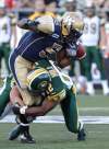 MIKE DEAL / WINNIPEG FREE PRESS
Winnipeg Blue Bombers' Chad Simpson (5) fumbles the ball after getting sandwiched by Edmonton Eskimos' JC Sherritt (47) and Edmonton Eskimos' T.J. Hill (12 Thursday at Canad Inns Stadium.