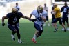 Trevor Hagan / Winnipeg Free Press
Winnipeg Blue Bombers' Cauchy Muamba (3), tries to hold up Brett Carter (72) while he waits for a pass from QB, Chase Clement (14), right, during practice at Investors Group Field Saturday.