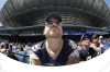 John Woods / The Canadian Press
Season ticket-holder Kevin Carlson checks out his team, the Winnipeg Blue Bombers, and the new Investors Group Field during opening day of training camp in Winnipeg Sunday.