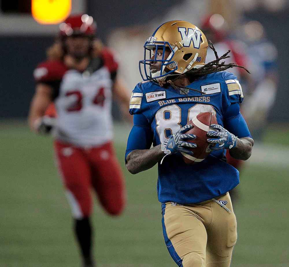 Phil Hossack / Winnipeg Free Press
Blue Bombers' Janarion Grant runs a missed Stampeders convert back for 2 points in the second half at IG Field Friday.