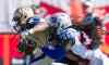 Graham Hughes / The Canadian Press
Montreal's Dominique Ellis, right, tackles Winnipeg 's Cameron Marshall during the first half of the game in Montreal. The Alouettes beat the Blue Bombers 35-14.