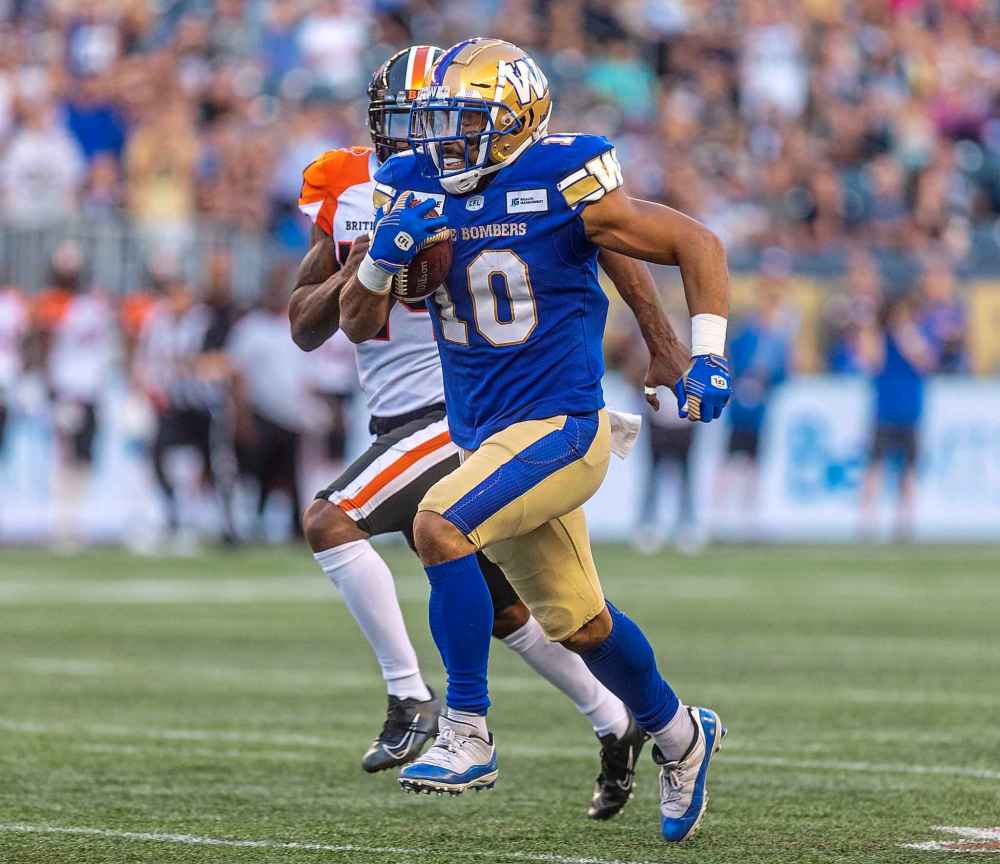 SASHA SEFTER / WINNIPEG FREE PRESS
Blue Bombers receiver Nic Demski runs for yardage after catching a pass in the first quarter against the B.C. Lions at IG Field Thursday night.