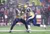 Adrian Wyld / The Canadian Press
Winnipeg Blue Bombers' quarterback Matt Nichols, left, hands the ball to running back Cameron Marshall during first half CFL action against the Ottawa RedBlacks, in Ottawa on Oct. 16.