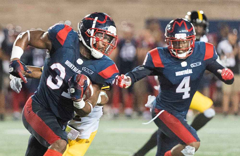 THE CANADIAN PRESS/Graham Hughes
Montreal Alouettes running back William Stanback, left.