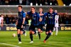 Atalanta's Marten De Roon, left, celebrates with his teammates after scoring from the penalty spot his side's opening goal during the Serie A soccer match between Atalanta and Udinese at the Atleti Azzurri d'Italia stadium in Bergamo, Italy, Monday, April 29, 2019. (Paolo Magni /ANSA via AP)