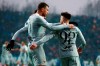 Roma's Stephan El Shaarawy, right, is cheered by teammate Edin Dzeko after scoring during the Italian Serie A soccer match between Atalanta and Roma in Bergamo, Italy, Sunday, Jan. 27, 2019. (Paolo Magni/ANSA Via AP)