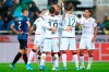 Cagliari's players celebrate the victory at the end of the Italian Serie A soccer match between Atalanta and Cagliari at the Gewiss Stadium in Bergamo, Italy, Sunday, Nov. 3, 2019. (Paolo Magni/ANSA via AP)