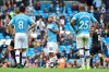 Manchester City's Sergio Aguero, center, reacts towards team mates after Wolverhampton Wanderers' Adama Traore's scored his second goal during the English Premier League soccer match between Manchester City and Wolverhampton Wanderers at Etihad stadium in Manchester, England, Sunday, Oct. 6, 2019. (AP Photo/Rui Vieira)