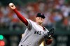 FILE - In this June 28, 2011 file photo, Boston Red Sox pitcher Bobby Jenks delivers during a baseball game against the Philadelphia Phillies in Philadelphia. Jenks reached an out-of-court settlement with Massachusetts General Hospital and the attending surgeon on Wednesday, May 8, 2019, over a December 2011 surgery he said caused his career-ending spine injury. (AP Photo/Matt Slocum, File)