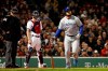 Toronto Blue Jays' Rowdy Tellez watches his two-run home run next to Boston Red Sox catcher Blake Swihart and umpire Lance Barrett during the third inning of a baseball game Thursday, April 11, 2019, at Fenway Park in Boston. (AP Photo/Winslow Townson)