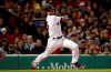 Boston Red Sox's Dustin Pedroia follows through on his RBI single against the Toronto Blue Jays during the third inning of a baseball game Thursday, April 11, 2019, at Fenway Park in Boston. (AP Photo/Winslow Townson)