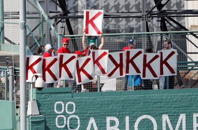 A fan holds up a