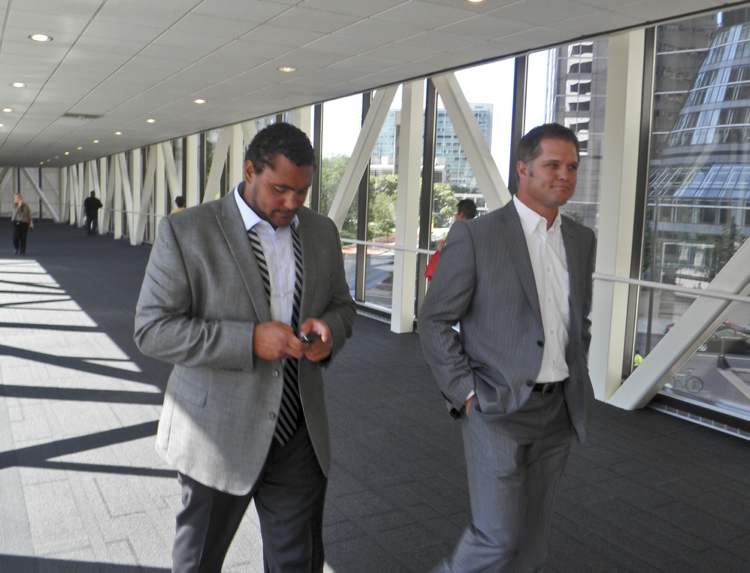MIKE MCINTYRE / WINNIPEG FREE PRESS
Winnipeg Jet Dustin Byfuglien (left), with his agent, Ben Hankinson, faces no jail time following a plea deal.