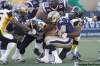 John Woods / Winnipeg Free Press
Winnipeg Blue Bombers' Buck Pierce (4) is sacked by Hamilton Tiger-Cats' Stevie Baggs (55) in Winnipeg last August.