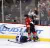 Charles Rex Arbogast / The Associated Press
Chicago Blackhawks left wing Daniel Carcillo (13) stands over injured Winnipeg Jets centre Mathieu Perreault (85) after a hit during the second period.