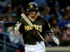 San Diego Padres' Manny Machado juggles his bat after striking out during the fourth inning of the team's baseball game against the Arizona Diamondbacks in San Diego, Friday, Sept. 20, 2019. (AP Photo/Alex Gallardo)