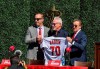 Los Angeles Angels general manager Billy Eppler, left, and team owner Arte Moreno, right, introduce the baseball team's new manager, Joe Maddon, during a news conference at Angel Stadium in Anaheim, Calif., Thursday, Oct. 24, 2019. (Jeff Gritchen/The Orange County Register via AP)
