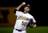 Oakland Athletics pitcher Mike Fiers works against the Cincinnati Reds during the first inning of a baseball game Tuesday, May 7, 2019, in Oakland, Calif. (AP Photo/Ben Margot)