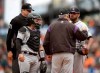 Colorado Rockies pitcher German Marquez, right, listens to manager Bud Black, second from right, in the first inning of a baseball game against the San Francisco Giants Wednesday, June 26, 2019, in San Francisco. (AP Photo/Ben Margot)