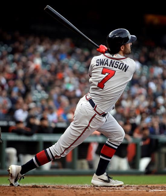 Atlanta Braves' Dansby Swanson watches his three-run home run off San Francisco Giants' Jeff Samardzija during the second inning of a baseball game Wednesday, May 22, 2019, in San Francisco. (AP Photo/Ben Margot)