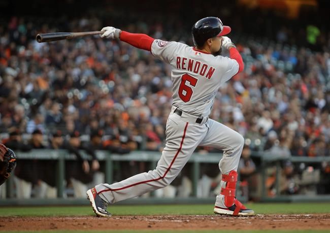 Washington Nationals' Anthony Rendon watches his RBI sacrifice fly off San Francisco Giants pitcher Conner Menez during the third inning of a baseball game Tuesday, Aug. 6, 2019, in San Francisco. (AP Photo/Ben Margot)