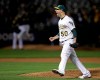 Oakland Athletics' Mike Fiers celebrates after pitching a no hitter against the Cincinnati Reds at the end of a baseball game Tuesday, May 7, 2019, in Oakland, Calif. (AP Photo/Ben Margot)