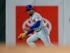 New York Mets left fielder Dominic Smith watches the game winning run score after failing to make the catch on a ball hit by San Francisco Giants' Pablo Sandoval in the tenth inning of a baseball game Friday, July 19, 2019, in San Francisco. Smith received an error on the play. (AP Photo/Ben Margot)