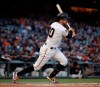 San Francisco Giants' Evan Longoria follows through on an RBI single off San Diego Padres' Joey Lucchesi during the second inning of a baseball game Tuesday, April 9, 2019, in San Francisco. (AP Photo/Ben Margot)