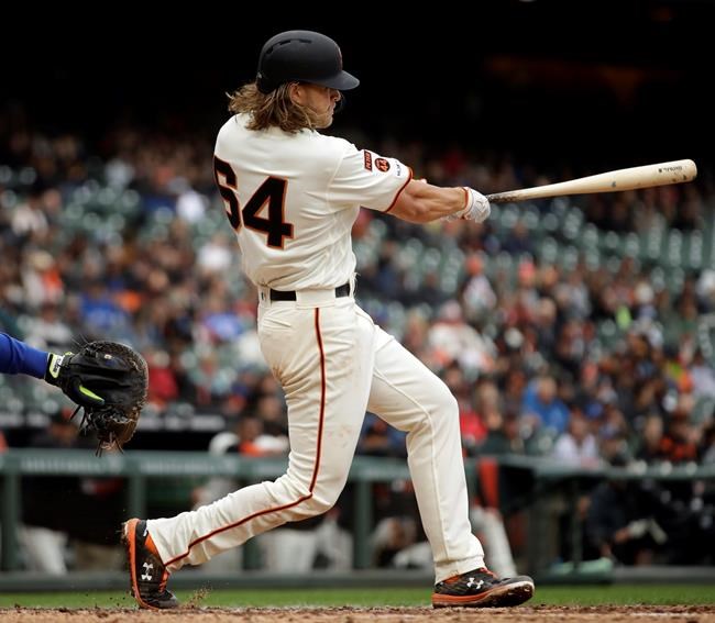 San Francisco Giants' Shaun Anderson swings for a single off Toronto Blue Jays' Edwin Jackson in the fourth inning of a baseball game Wednesday, May 15, 2019, in San Francisco. (AP Photo/Ben Margot)
