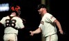 San Francisco Giants pitcher Will Smith, right, celebrates with catcher Buster Posey at the end of the team's baseball game against the Colorado Rockies Thursday, April 11, 2019, in San Francisco. The Giants won 1-0. (AP Photo/Ben Margot)