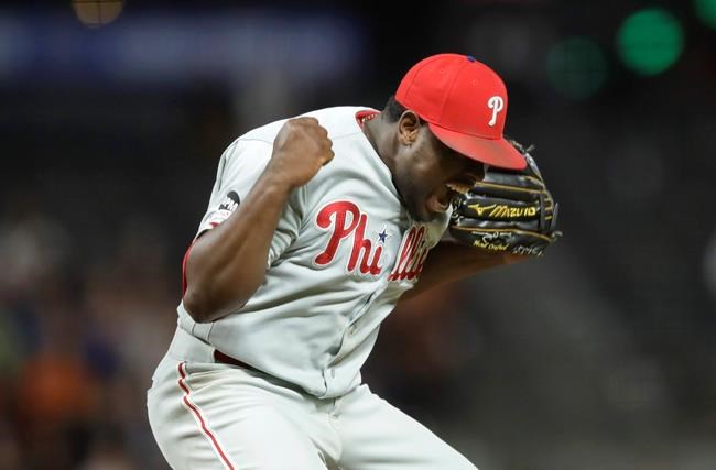 Philadelphia Phillies' Hector Neris reacts as the final out is made against the San Francisco Giants in a baseball game Friday, Aug. 9, 2019, in San Francisco. (AP Photo/Ben Margot)