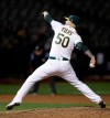 Oakland Athletics' Mike Fiers works against the Cincinnati Reds in the ninth inning of a baseball game Tuesday, May 7, 2019, in Oakland, Calif. (AP Photo/Ben Margot)