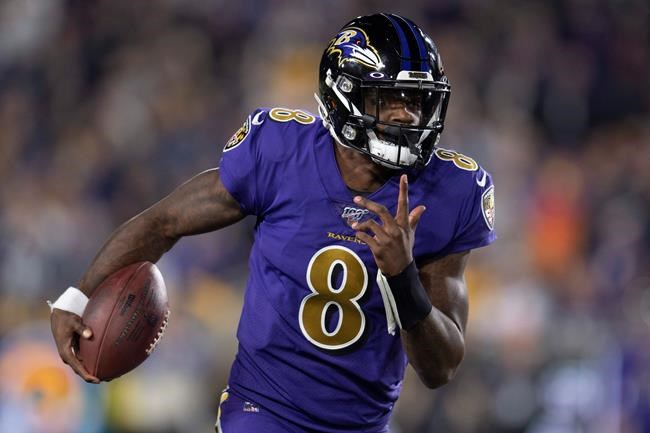 Baltimore Ravens quarterback Lamar Jackson runs against the Los Angeles Rams during the first half of an NFL football game Monday, Nov. 25, 2019, in Los Angeles. (AP Photo/Kyusung Gong)