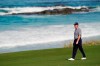 Ernie Els, of South Africa, walks along the fairway on the 10th hole during a practice round for the U.S. Open Championship golf tournament Tuesday, June 11, 2019, in Pebble Beach, Calif. (AP Photo/David J. Phillip)