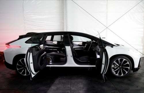 The Faraday Future FF 91, a long, low, and luxurious four-door EV is shown during the 