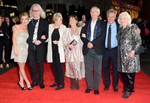 FILE - In this Oct. 15, 2012 file photo, from left, Sheridan Smith, Billy Connolly, Dame Maggie Smith, Pauline Collins, Tom Courtenay, Dustin Hoffman and Dame Gwyneth Jones pose at the London Film Festival American Airlines Gala -Quartet at Odeon West End, in London. The 75-year-old Hoffman went behind the camera for “Quartet,” starring Smith, Courtenay, Connolly and Collins as aging British opera divas at a retirement home for musicians who put aside past differences for a reunion concert. (Photo by Jon Furniss/Invision, File)