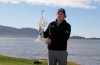 Phil Mickelson poses with his trophy on the 18th green of the Pebble Beach Golf Links after winning the AT&T Pebble Beach Pro-Am golf tournament Monday, Feb. 11, 2019, in Pebble Beach, Calif. (AP Photo/Eric Risberg)
