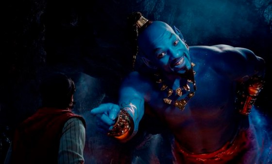 Mena Massoud as Aladdin, left, and Will Smith as Genie in Disney's live-action adaptation of the 1992 animated