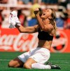 FILE - In this July 10, 1999, file photo, the United States' Brandi Chastain celebrates by taking off her jersey after kicking in the game-winning penalty shootout goal against China in the FIFA Women's World Cup Final at the Rose Bowl in Pasadena, Calif. The last time the United States played China was at the World Cup final in 1999. The two countries play on Friday in the quarterfinals of the FIFA Women's World Cup in Canada. (Lacy Atkins/The San Francisco Examiner via AP) MANDATORY CREDIT